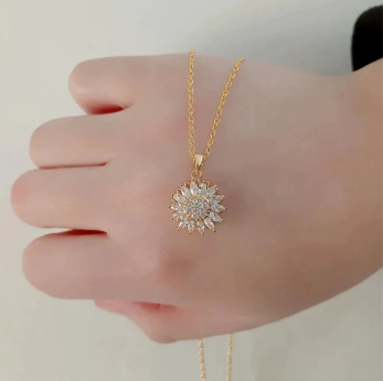 🌻 Encantador collar girasol giratorio - Diseño exclusivo en acero y cobre, caja de lujo. - Oferta 50% DCTO🏷️ 💥