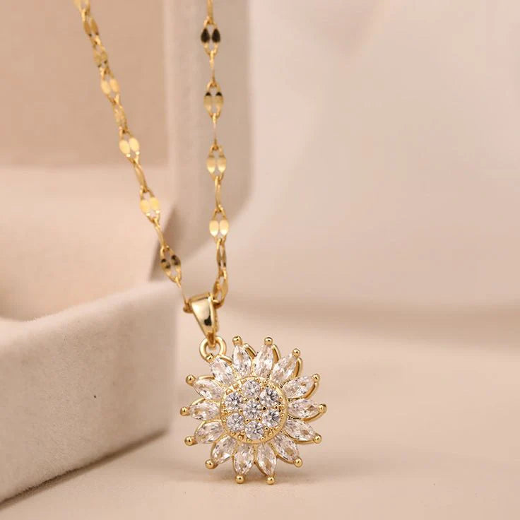 🌻 Encantador collar girasol giratorio - Diseño exclusivo en acero y cobre, caja de lujo. - Oferta 50% DCTO🏷️ 💥